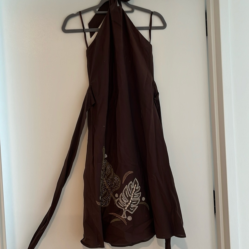 Brown low-back dress with tie waist